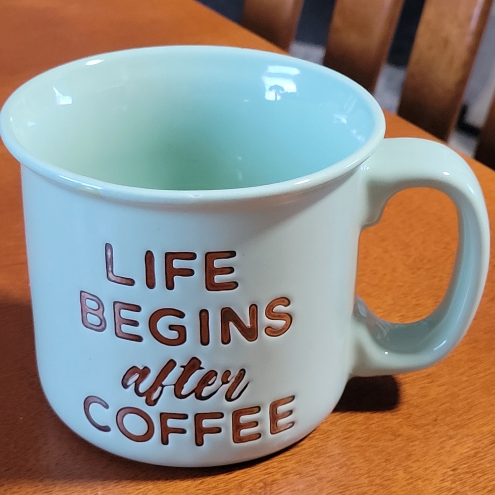Cute mint green coffee cup